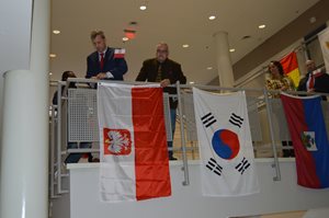 Professors Bronislaw Czarnocha and Jarek Stelmark. Flags.