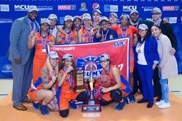 Hostos Lady Caimans basketball team. Award.