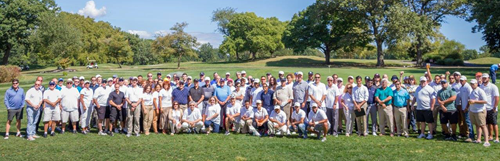 Group pictured. Outside setting.