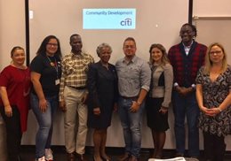Hostos students received a free "Financial Literacy Empowerment Workshop" thanks to a partnership with Citi Community Development. Two Citi representatives, Lily López and Pat Edwards.5 women. 3 men.