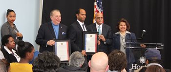 Dr. Pedro R. Rivera. 1 woman, standing. 2 men, standing. 1 woman speaker. crowd seated. awards. certificate.