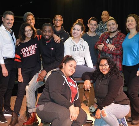 (Back row, L-R): Hostos Repertory Company Director Angel Morales, Reynaldo Martinez, Destiny Allen, Andrew Vinals, Jairo Peña, Frank Lopez and Hostos faculty and Rep Director Natasha Yannacañedo. (Middle row): Cosmic Babe shirt (Thalia Lopez), James Saunders, and woman in Gap Krystal Lopez. (Front row) Anna Rios and Thanna Son.