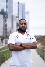 Mala Nursing student dressed in white